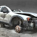 Severely Damaged Car With Broken Front End Dented Body And Shattered Glass After Collision