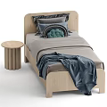Single Bed with Wooden Frame Gray Sheets Blue Blanket Green Dark Pillows and Bedside Table