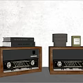 Vintage Wooden Stereo Speakers With Decorative Books And Candles On Tabletop