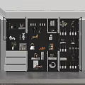Modern Multi Tiered Wine Cabinet With Glass Doors Holding Wine Bottles And Decorative Items