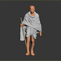 Bald Headed Barefoot Man In Light Colored Robe Holding Staff Model Figure Against Dark Background