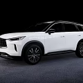 White Infiniti SUV With Sleek Design And Black Accents On Gray Floor