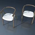 Two Stylish Wooden Chairs with White Cushions and Curved Armrests on Gray Background