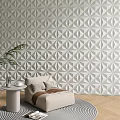 Geometric Patterned Accent Wall Behind Light Beige Sofa