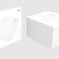Xiaomi White Body Weight Scale With Stacked Packaging Boxes And Sleek Design