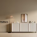 Modern White Entryway Console Cabinet With Vertical Slats Floor Lamp Wall Art And Decorative Accessories