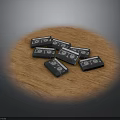 Shiny Black Square Objects Arranged On Smooth Wooden Surface