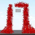 Red Flower Covered Art Installation With Tall Columnar Structures Against Blue Sky
