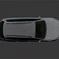 Silver Station Wagon With Roof Rack Modern Design Sleek Body And Alloy Wheels