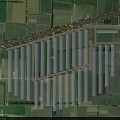 Aerial Planning of Organized Greenhouse Complex Within Agricultural Farmland Layout With Road And Vegetation