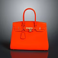 Vibrant Orange Leather Handbag With Top Handle Gold Metal Clasp And Structured Design