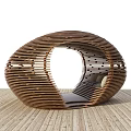 Modern Wooden Oval Outdoor Seating Structure With Cushioned Sofa And Wooden Floor For Relaxation Space