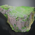 Natural Rock Formation With Green Vegetation Columnar Cliffs And Winding Pathway In Lush Landscape