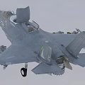 Gray Fighter Jet With Extended Landing Gear And Missiles In Flight