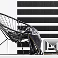 Modern Rattan Leisure Chair in Indoor Setting with Striped Backdrop