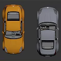 Yellow And Silver Sports Coupe Cars Displayed On Dark Reflective Surface