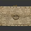 Intricately Carved Wooden Decorative Chest With Floral Patterns And Metal Handle