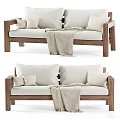 Cozy Modern Two Seater Sofa With Wooden Frame Light Cushions And Blanket