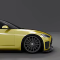 Yellow Sports Car With Black Roof Sleek Design And Alloy Wheels