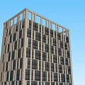 Modern High Rise Office Building With Glass Facade And Commercial Entrance