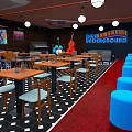 Blue Underground Interior Scene Featuring Wooden Tables Chairs Blue Stools Red Carpet And Diamond Tiles
