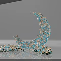 Beautiful Crescent Moon Decorative Arrangement With Blue Orange Flowers Crystal Accents And Scattered Blooms