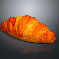 Golden Flaky Croissant With Buttery Layers On Dark Background