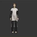 Woman Wearing White Top With Green And Black Spliced Sleeves Black Pants And Shoes