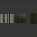 Furniture With Stacked Books In Different Heights Gray Green Covers And Reflective Surface