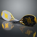 Stylish Sports Rackets White And Black With Yellow Logos Gold Accents Shiny Surface