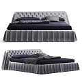 Modern Tufted Bed With Pleated Skirt And Navy Bedding