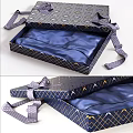 Elegant Gift Box With Blue Satin Lining Gold Geometric Pattern And Ribbon Accents