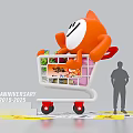 Orange Cartoon Character in Shopping Cart with Drinks Snacks Anniversary 2015 to 2025 Photo Spot