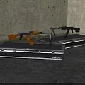 Military Weapons Including Assault Rifles Placed On Metal Storage Cases Against Rough Wall