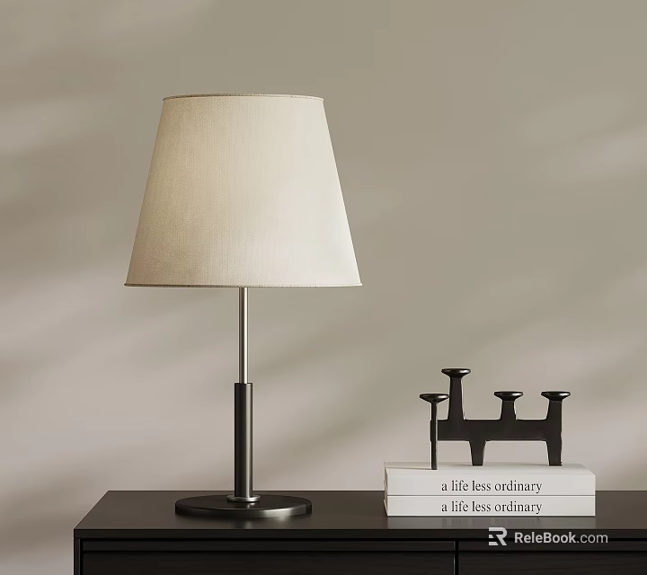 Modern Table Lamp with Fabric Shade and Metal Base Near Black Candle Holder on Books 3d model 