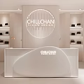 Chilichan Women's Fashion Store With White Counter Hanging Clothes And Shelves