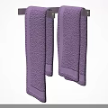 Two Soft and Absorbent Purple Textured Towels Hanging in Home Bathroom