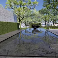 Water Fountain with Pool Reflection Surrounded by Trees Green Hedge Gray Wall Under Blue Sky