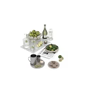 Fresh Green Apples Limes and Citrus Slices with Refreshing Drinks on Marble Tray