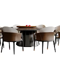 Modern Round Dining Table Set With Brown Leather Chairs And Tray Of Red Fruits
