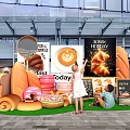 Outdoor Interactive Zone Featuring Breakfast Display Signs Bread Donuts Coffee And People 3d model