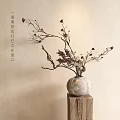 Celadon Vase with Dried Branches and Red Berries Standing by Window on Wooden Stump