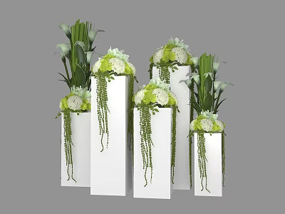 Green and White Flowers Arrangement with Hanging Green Vines in White Cube Vases 3d model