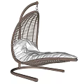 Modern Wicker Swing Chair with Metal Stand and White Cushion for Comfortable Relaxation