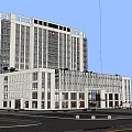 Modern Hospital Building Featuring High Rise Structure Light Colored Exterior Red Cross Sign And Surrounding Trees