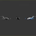 Toy Airplane Models Featuring White Gray And Blue Colors On Dark Surface