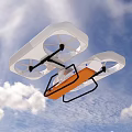 Manned Flying Vehicle With White Body Four Propellers And Orange Seat