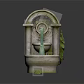 Decorative Stone Two Tiered Fountain With Leaf Accents And Grass Base