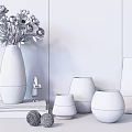 Transparent Glass Vases With White Flowers And Golden Bases On Wooden Tabletop Against Gray Wall