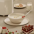 Creamy Dessert in White Bowl with Gold Leaf Red Berries Donuts Chocolate Cake and Milk
